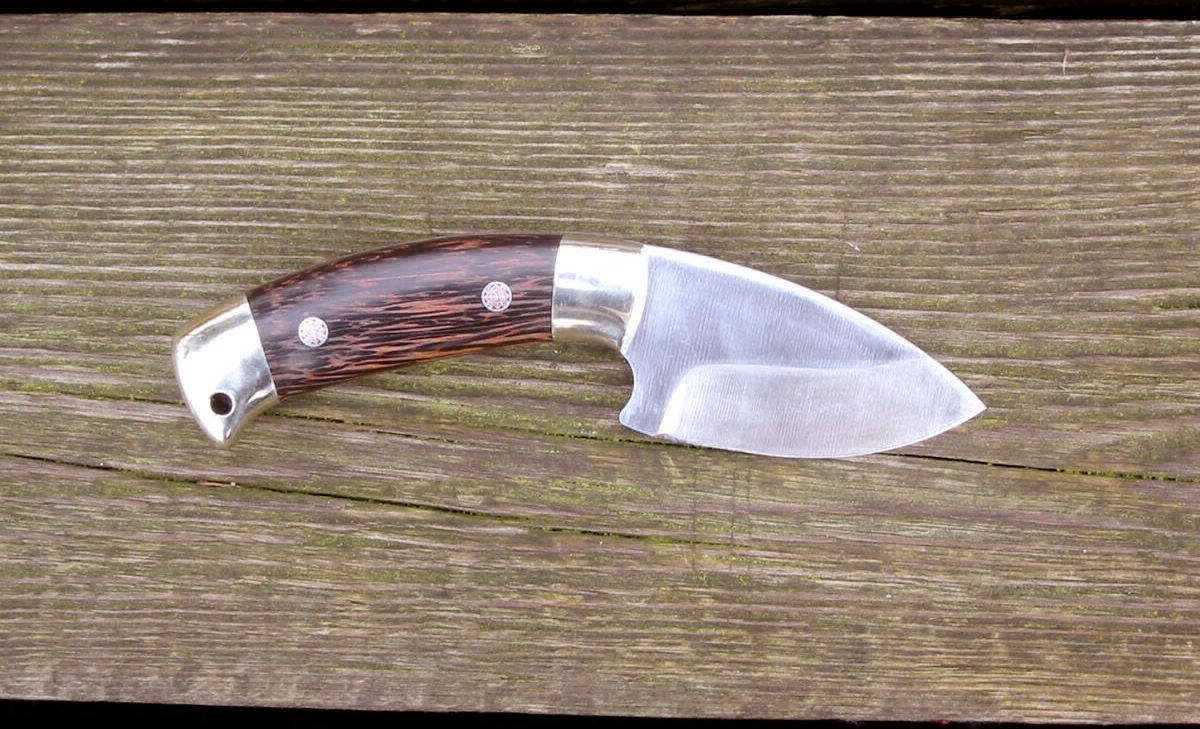 Skinnerklinge; Griff: Palmholz, Neusilber