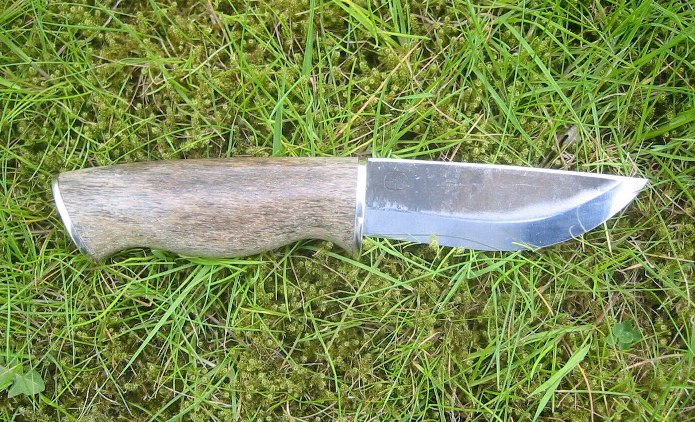 Klinge: Lauri; Griff: Mammutrippe, Neusilber